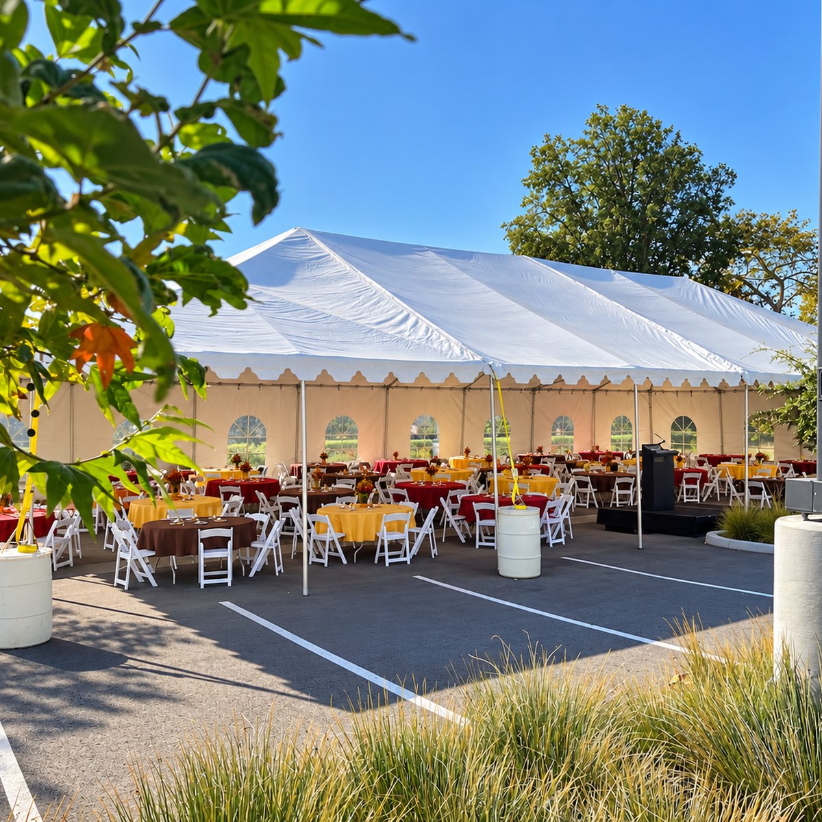 Outdoor tented reception with colorful table settings